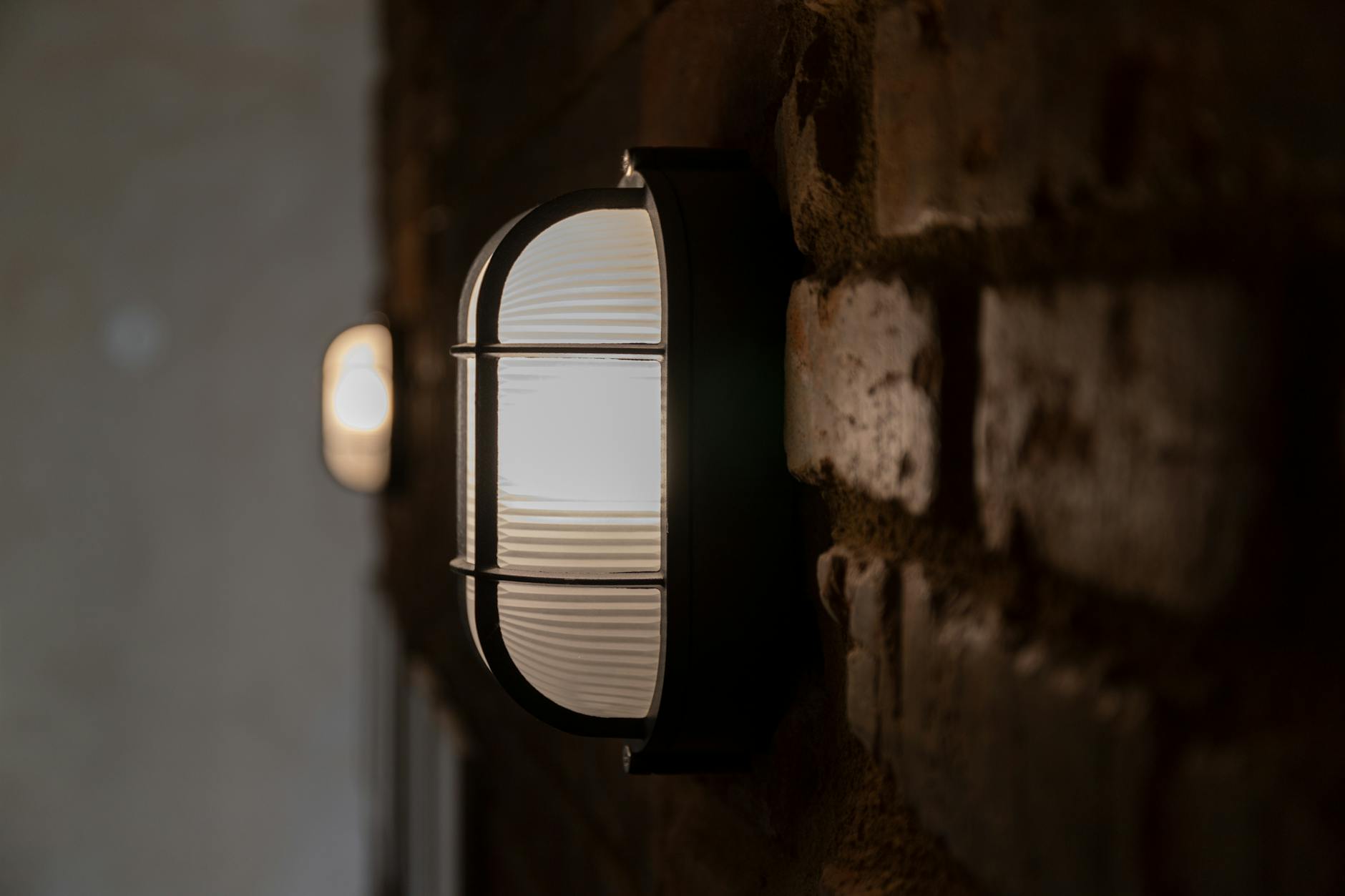 glass lamp cover on wall